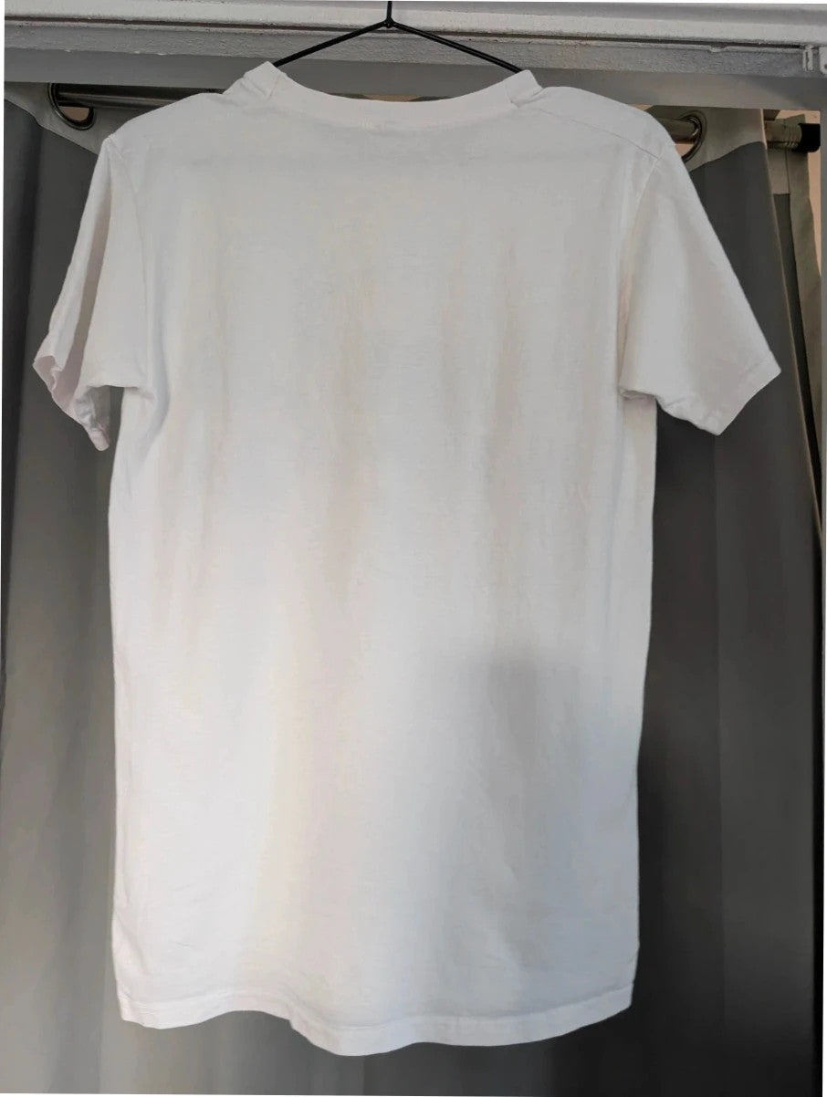 Y2K white pocket t-shirt featuring Girls Aloud band graphic and typography print.