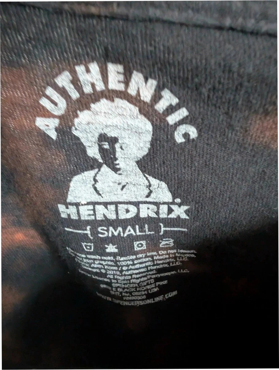 Hendrix graphic tee black bleach tie dye featuring vibrant Jimi Hendrix guitar design.
