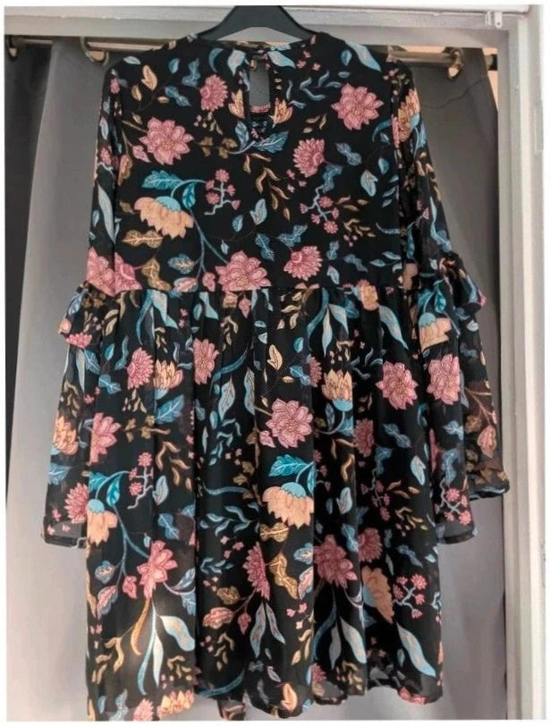 New Look black floral smock dress with bell sleeves and ruffle cuffs, semi-sheer chiffon.