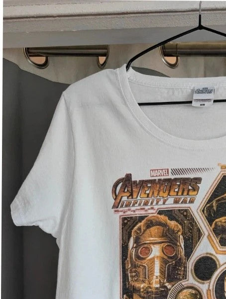 Marvel white graphic tee featuring Black Panther, Iron Man, and Captain America prints.