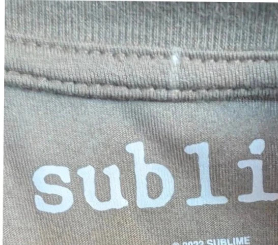 Sublime khaki graphic tee featuring distressed sun artwork and bold red gothic font.