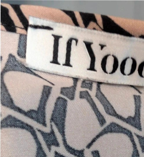 If Yoou beige tunic dress with black geometric print and split Mandarin collar.