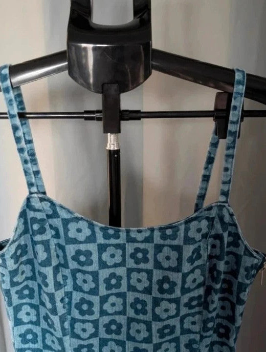 H&M blue floral checkered denim cami mini dress with fitted silhouette and thin straps.