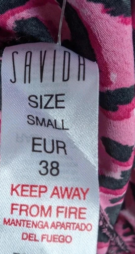 Savida pink and black leopard print mini dress with ruffle details and frill neckline.