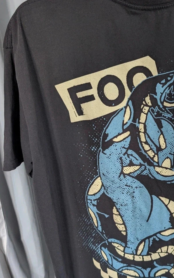 Foo Fighters black graphic tee with coiling snake and checkerboard pattern, soft cotton.