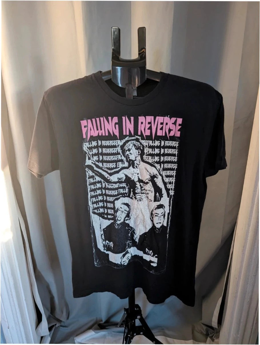 Next Level black graphic tee featuring pink Falling In Reverse logo and band portrait.