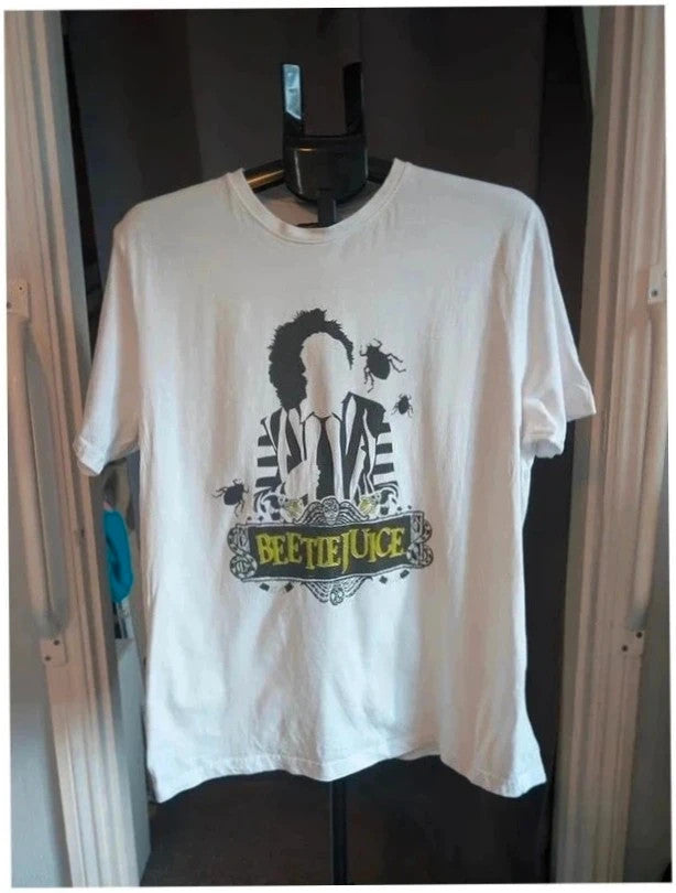 Primark black graphic t-shirt featuring Beetlejuice movie prints on front and back.