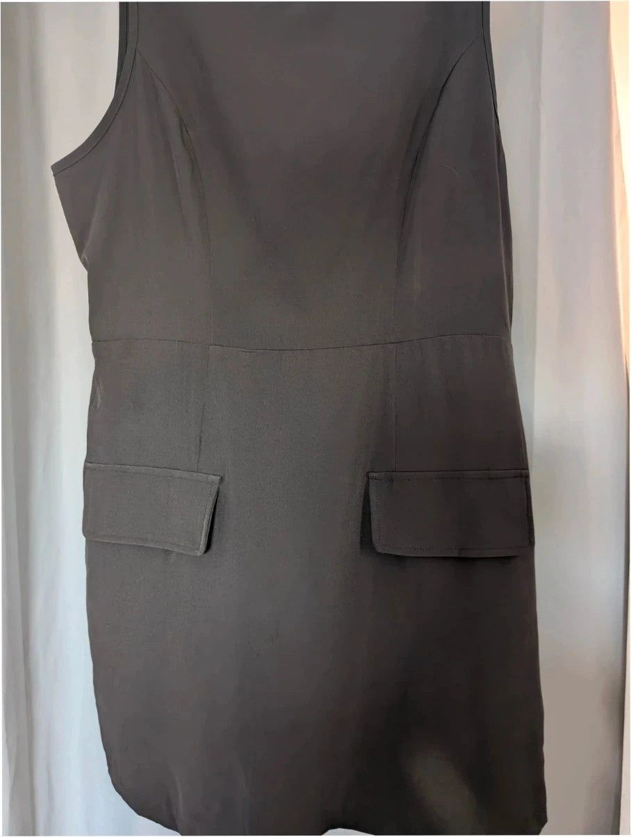 SHEIN black sleeveless mini dress with front flap pockets and back zip fastening.