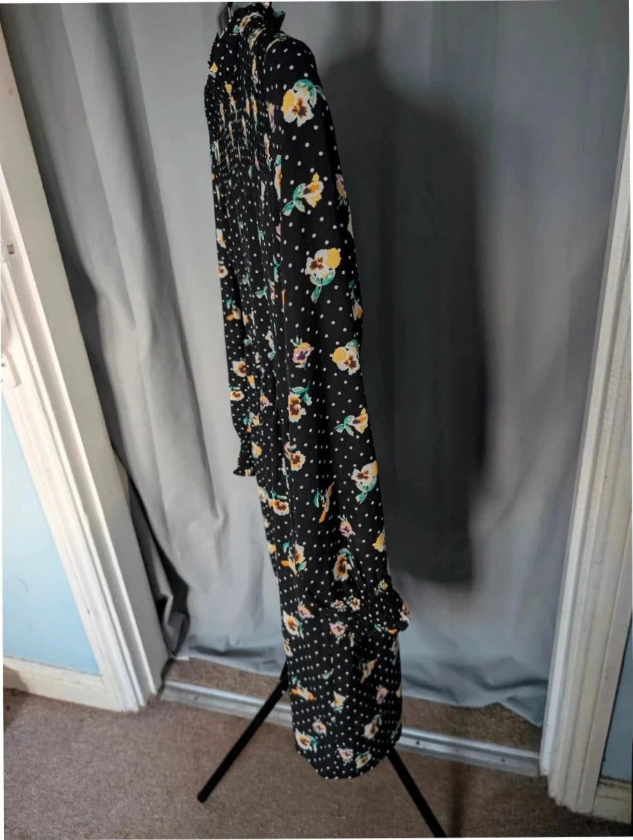 JDY black smock mini dress with floral and polka dot print, long sleeves, and keyhole back.