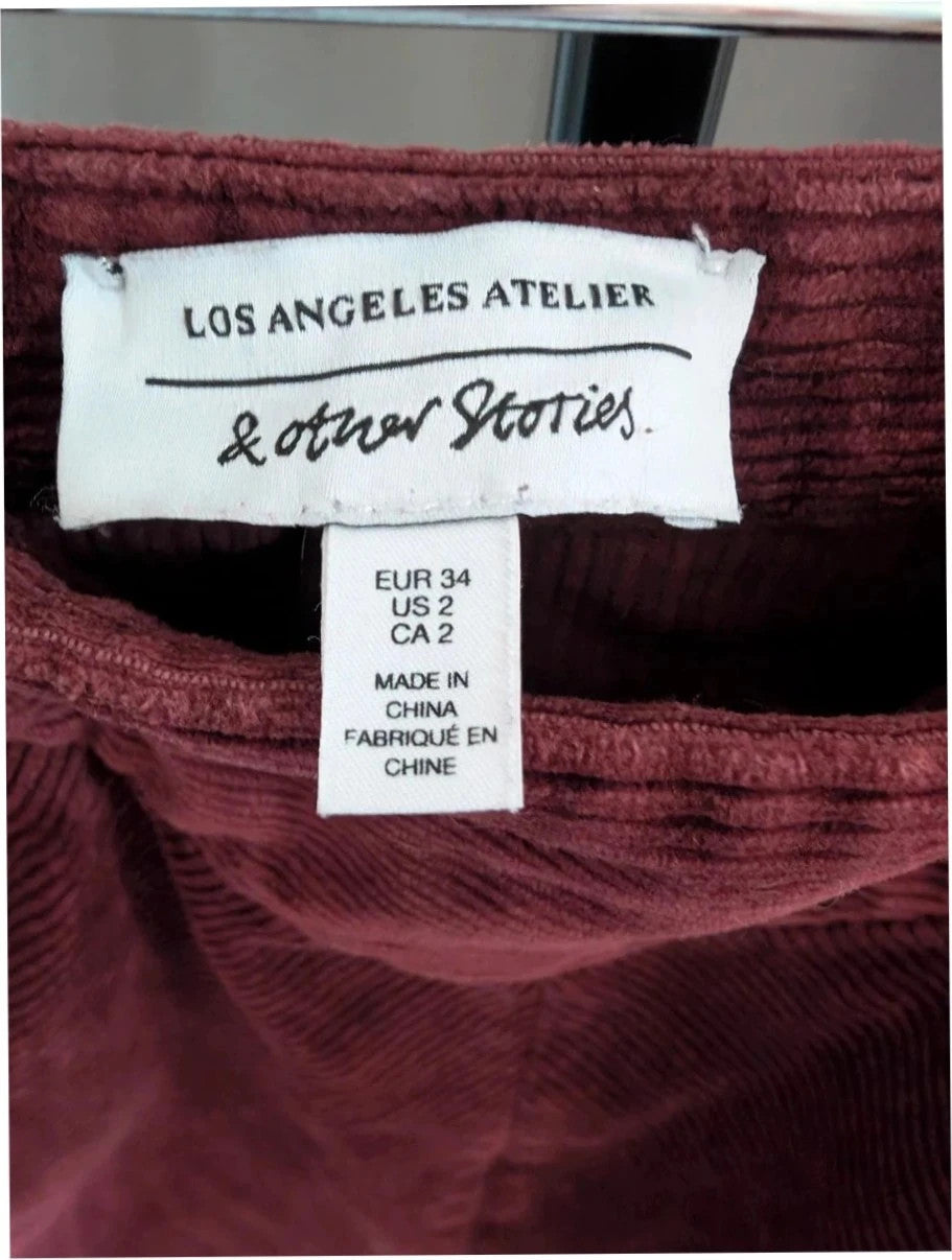 & Other Stories burgundy corduroy mini skirt with Western yoke and front slant pockets