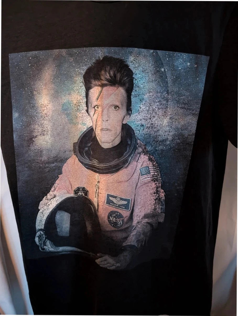LaBarNa black graphic t-shirt featuring Ziggy Stardust lightning bolt astronaut print.
