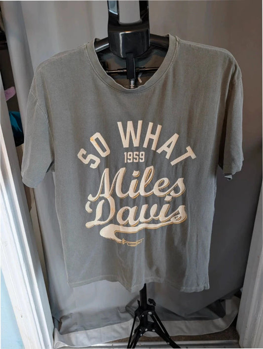 Miles Davis grey graphic t-shirt with "So What 1959" typography and trumpet artwork.