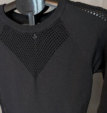 Blue Vanilla black bodycon mini dress with mesh cutouts and ribbed neckline.