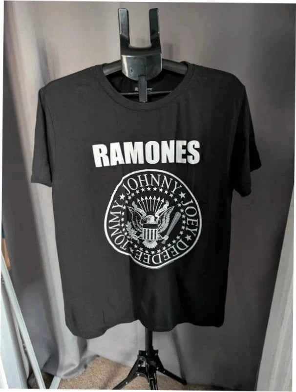 Ramones black graphic t-shirt featuring eagle logo and band member names in white.
