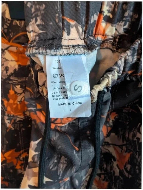 Crafted grey orange leaf camo cargo trousers with multiple pockets and elastic waistband.