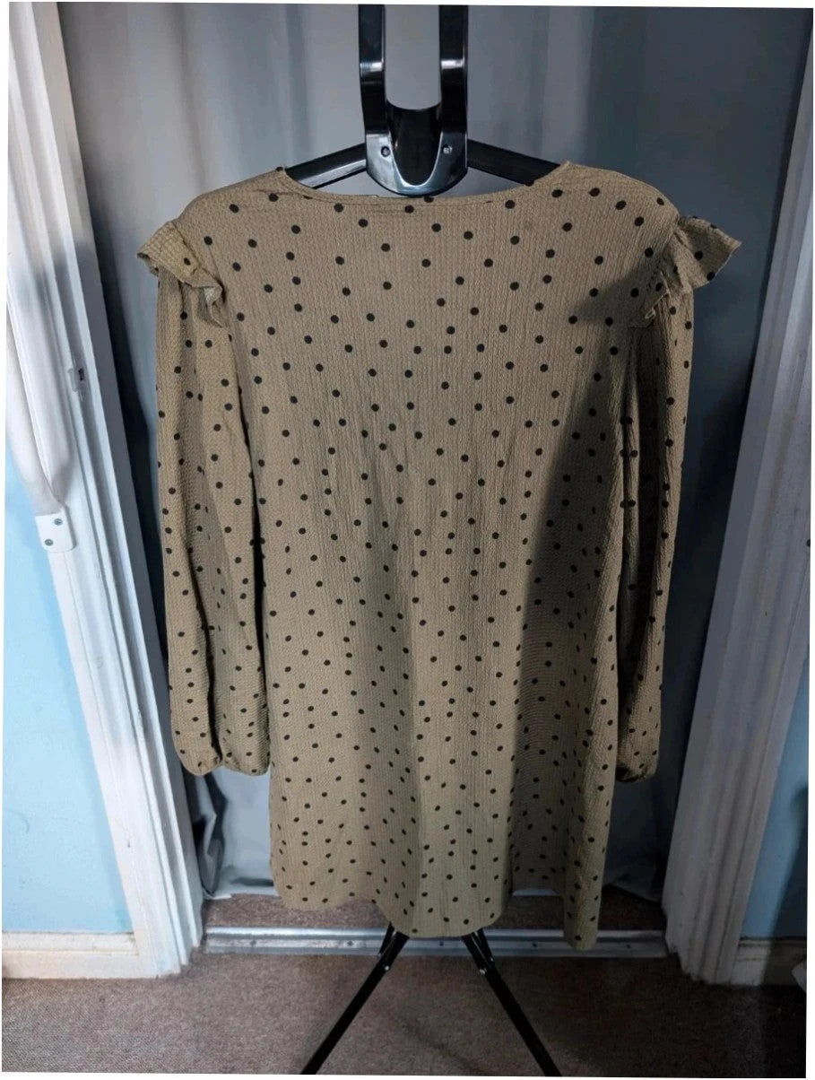 Primark khaki green polka dot tunic dress with ruffle sleeves and V-neckline.