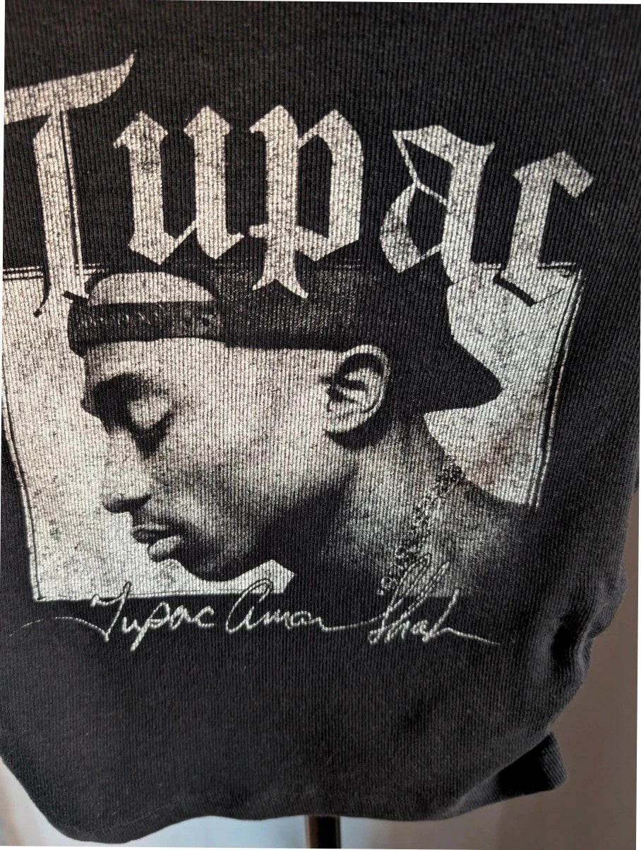 Primark black crop top featuring Tupac portrait graphic and ruched side detailing.