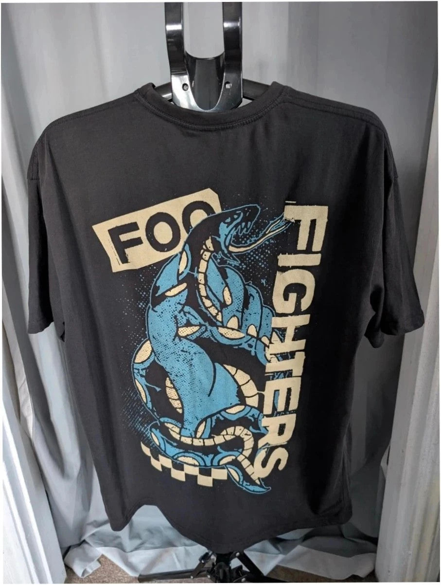 Foo Fighters black graphic tee featuring coiling snake design and blue checkerboard pattern.