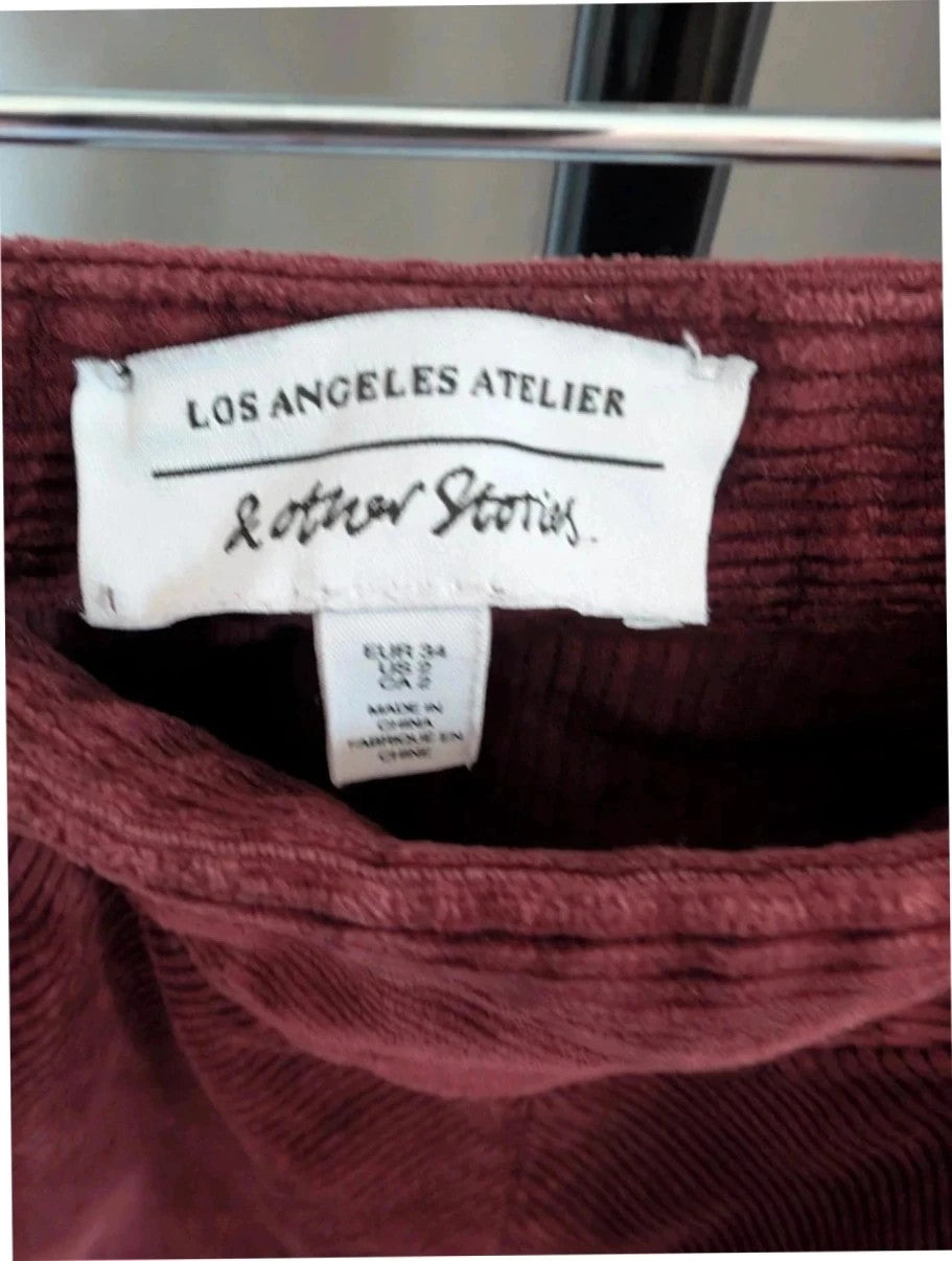 & Other Stories burgundy corduroy mini skirt with Western yoke and front slant pockets