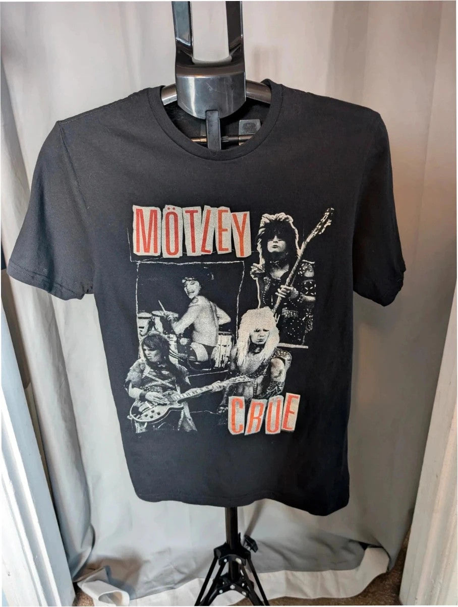 Mötley Crüe black graphic tee featuring retro collage artwork and red block logo.
