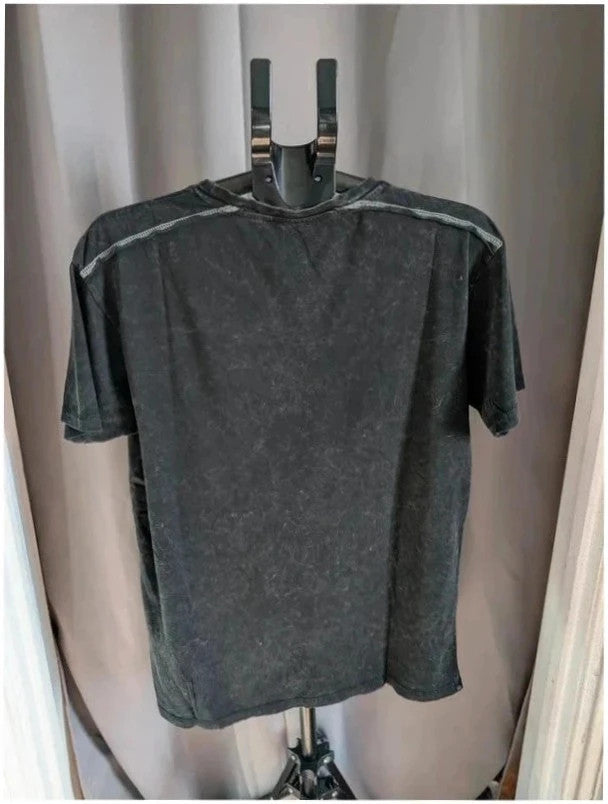 Billie Eilish acid wash pocket t-shirt black with neon green and red graphic design.