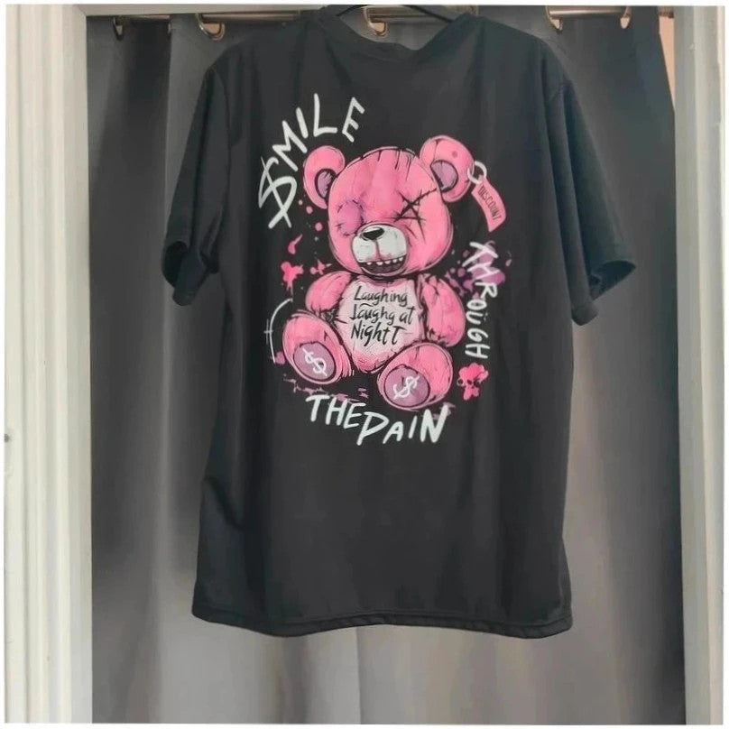 Unbranded black graphic t-shirt with neon pink teddy bear and bold text design.