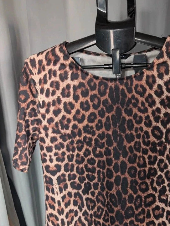 Peacocks leopard print shift mini dress in black and brown with scoop neckline and short sleeves.