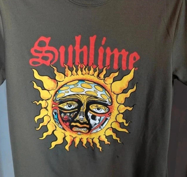 Sublime khaki graphic tee featuring distressed sun artwork and bold red gothic font.