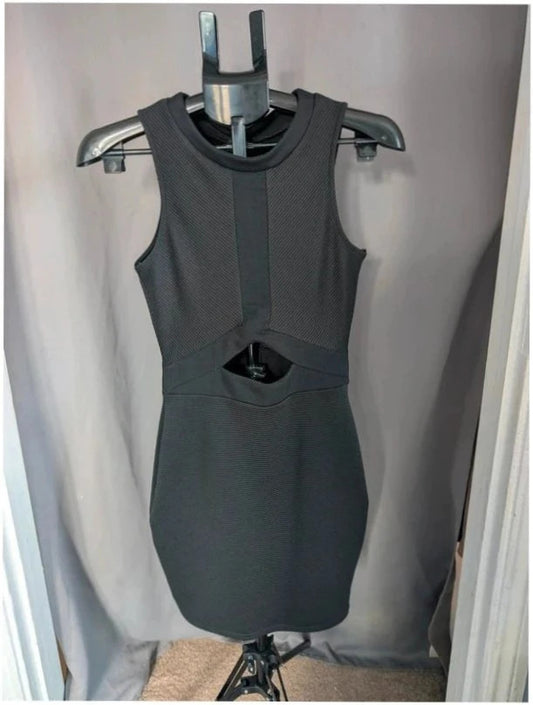 River Island black bodycon mini dress with ribbed texture and midriff cut-out detail.
