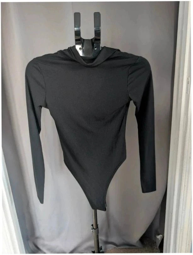 Select black ribbed long sleeve collared bodysuit with deep v-neck and popper fastenings.