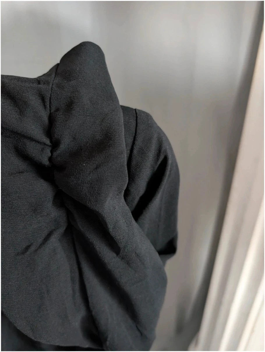 Marks & Spencer black blazer jacket with ruched sleeves and collarless design.