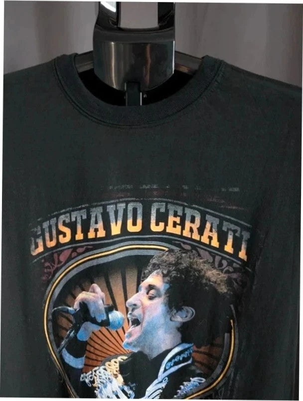 Gustavo Cerati black graphic t-shirt with vibrant print and white lettering, 100% cotton.