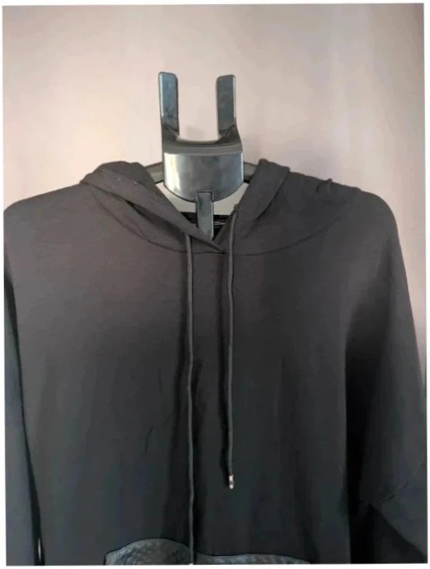 Italy Moda black oversized hoodie with faux leather trim and kangaroo pocket accents.