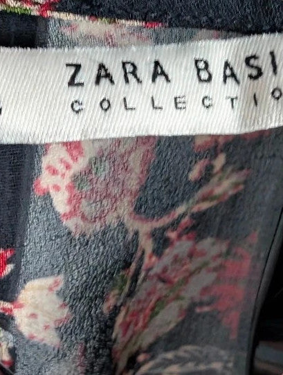 Zara black floral chiffon tunic blouse with tiered ruffle bib and crochet lace details.