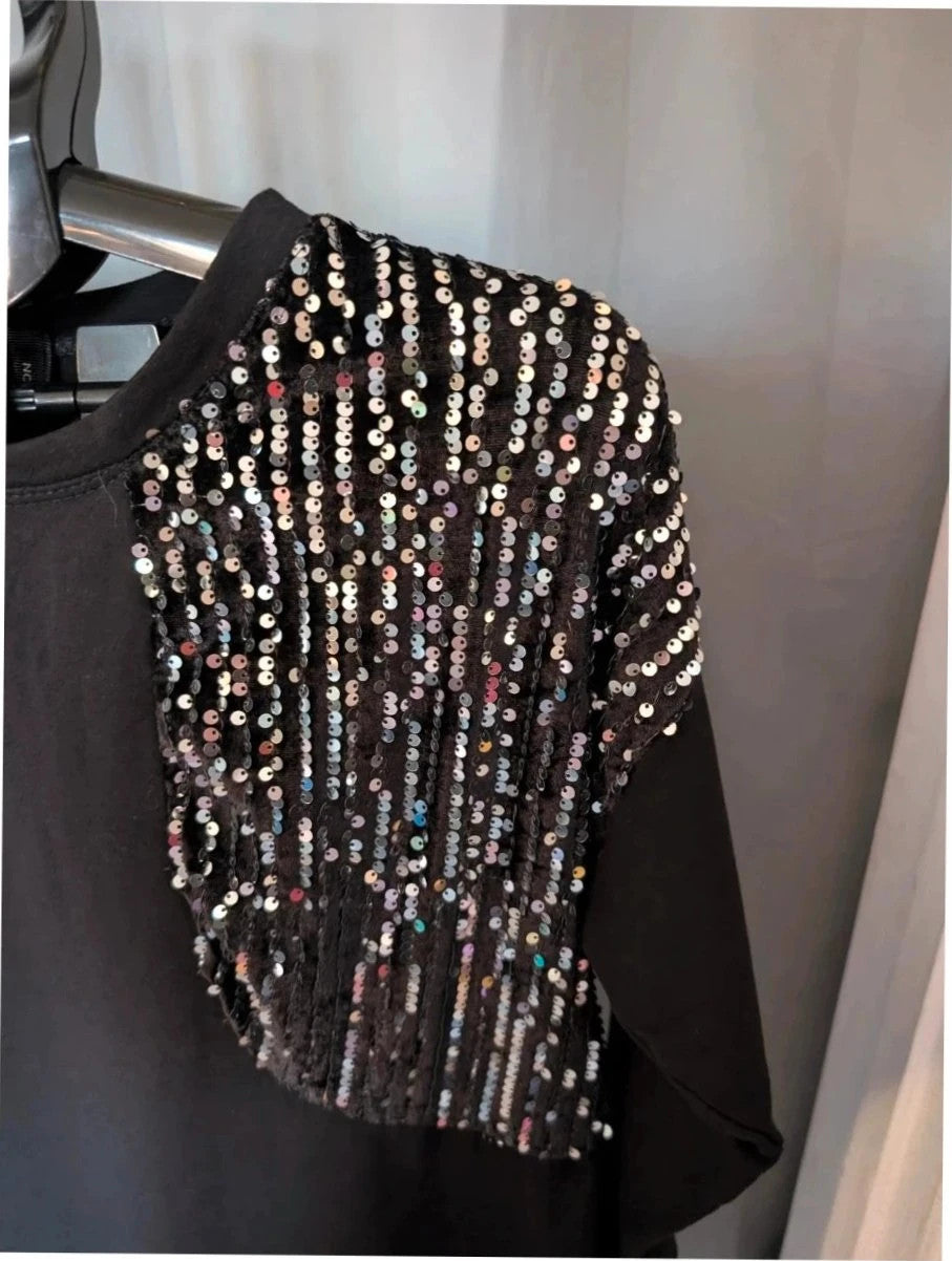 New Collection black tunic dress with silver sequin panels and relaxed crew neckline.