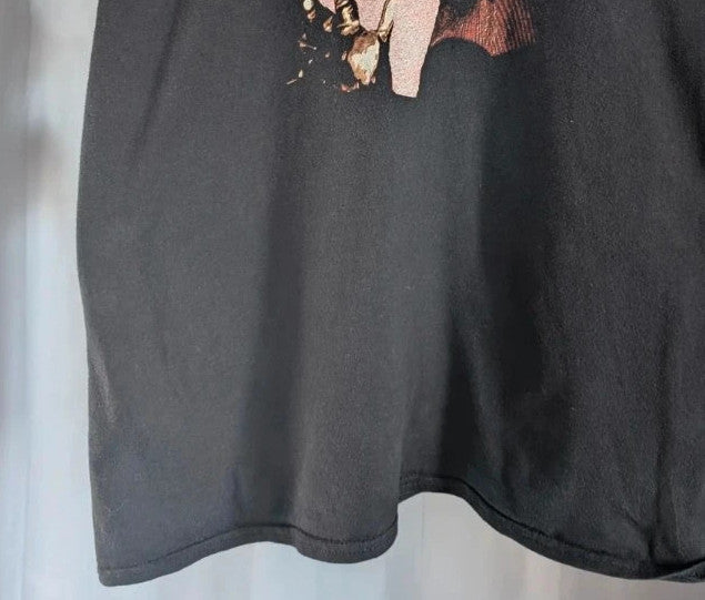 Gildan black graphic tee featuring Freddy Krueger print, soft 100% cotton material.