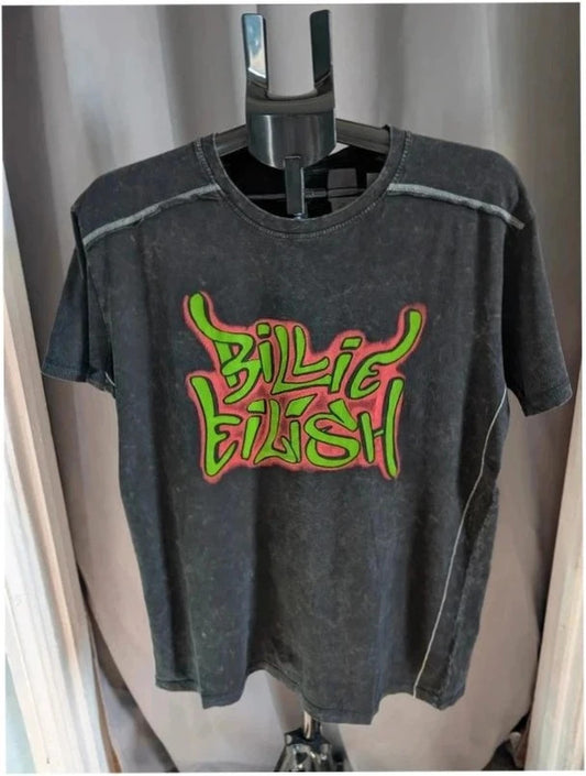 Billie Eilish acid wash pocket t-shirt black with neon green and red graphic design.