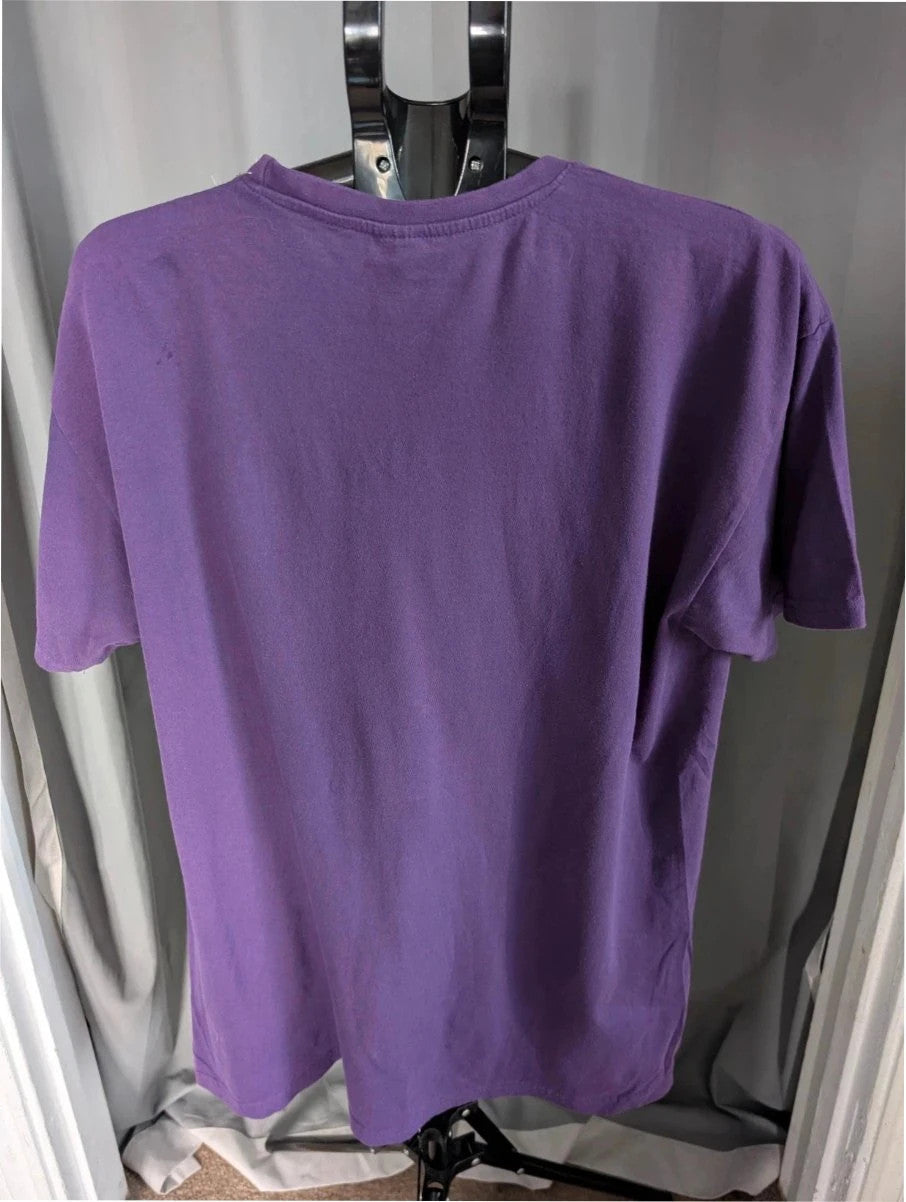 Blink-182 purple graphic t-shirt featuring smiley face logo with neon pink drip detailing.