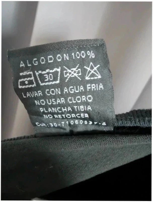 Gustavo Cerati black graphic t-shirt with vibrant print and white lettering, 100% cotton.