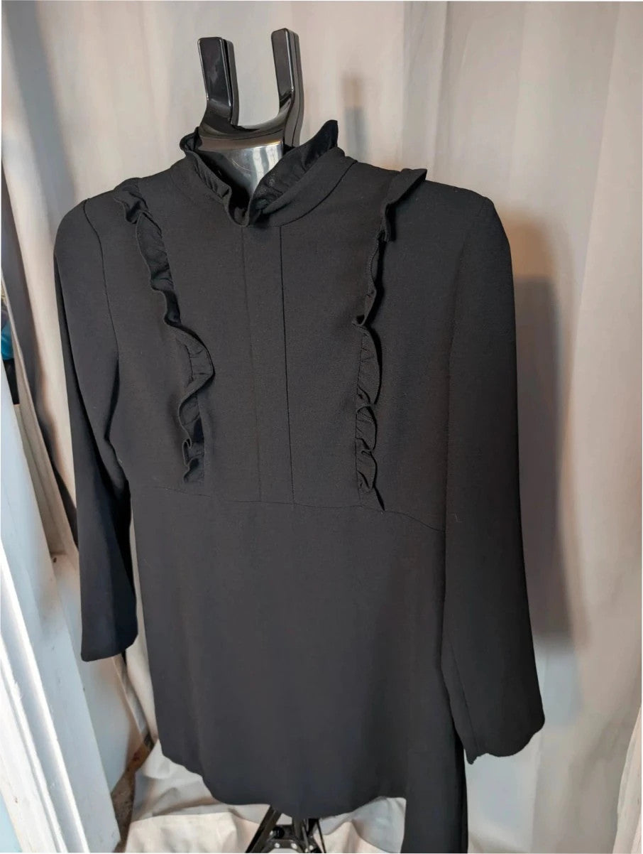 Zara Woman black pencil dress with high frill neckline and vertical ruffle trim.