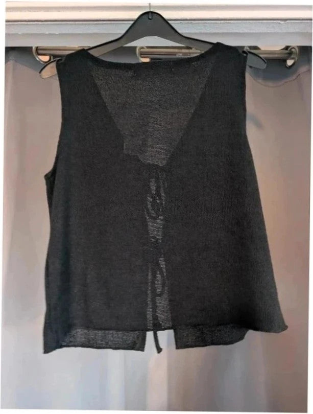 Primark black knit sleeveless vest top with tie front detail and V-neckline.