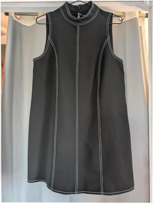 River Island black sleeveless mini dress with white contrast stitching and mock neck collar.