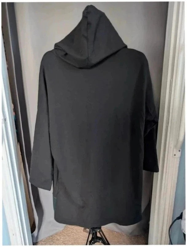 Italy Moda black oversized hoodie with faux leather trim and kangaroo pocket accents.