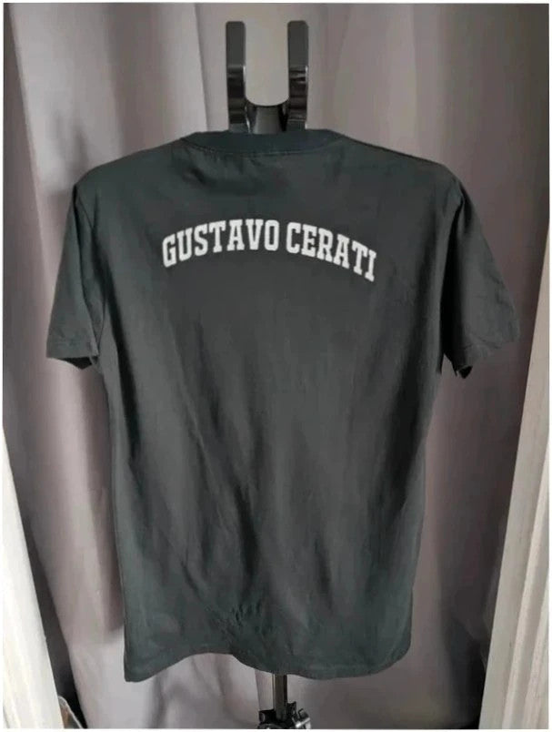 Gustavo Cerati black graphic t-shirt with vibrant print and white lettering, 100% cotton.