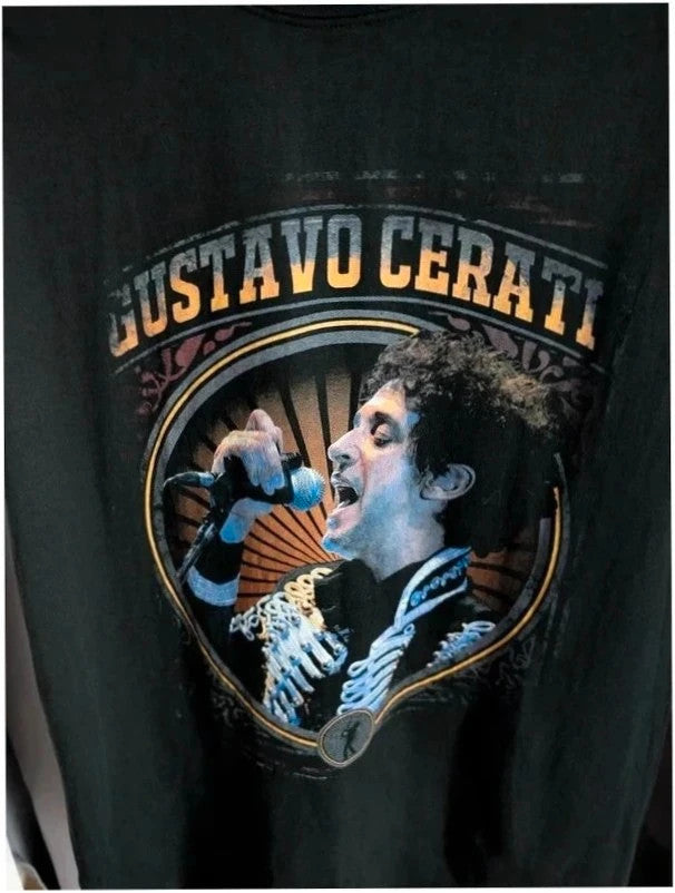 Gustavo Cerati black graphic t-shirt with vibrant print and white lettering, 100% cotton.
