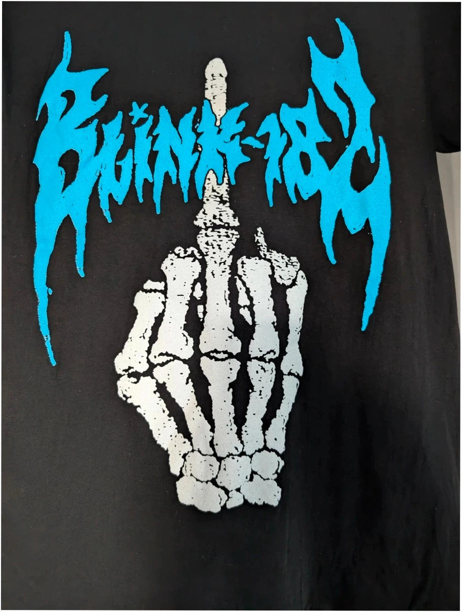Blink 182 black graphic tee with blue skeleton middle finger design and crew neck.