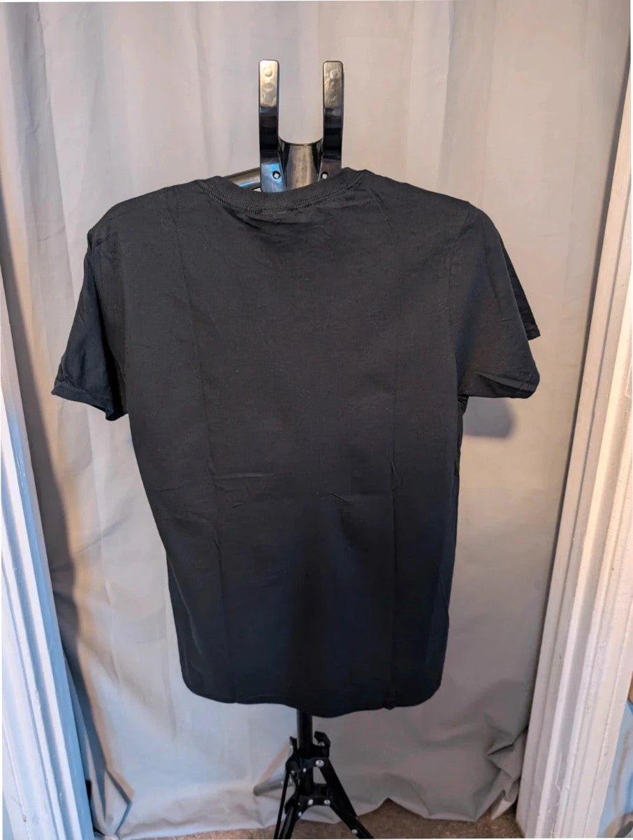 Superman black graphic tee with distressed metallic orange shield logo on soft cotton.