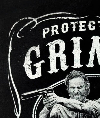 The Walking Dead black graphic tee featuring Rick Grimes and Daryl Dixon print.
