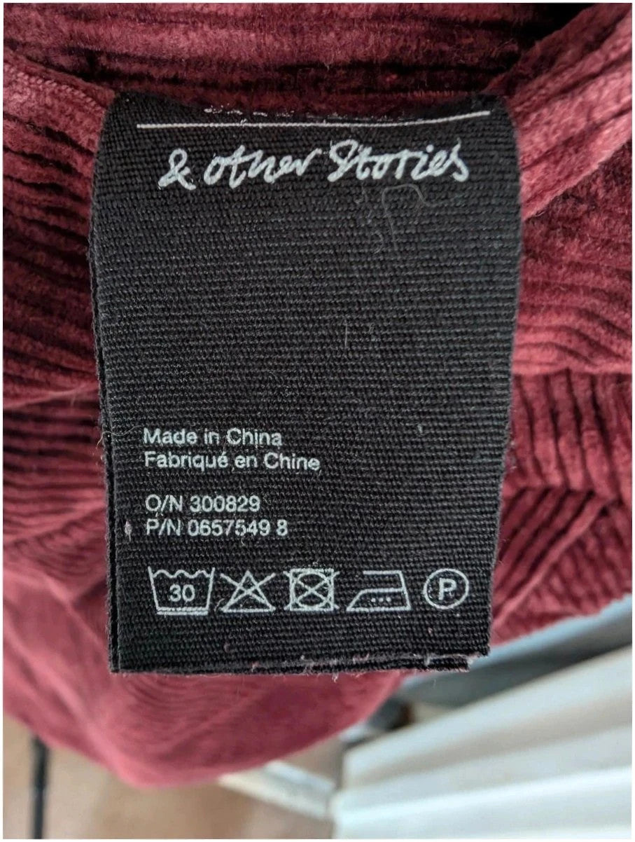 & Other Stories burgundy corduroy mini skirt with Western yoke and front slant pockets