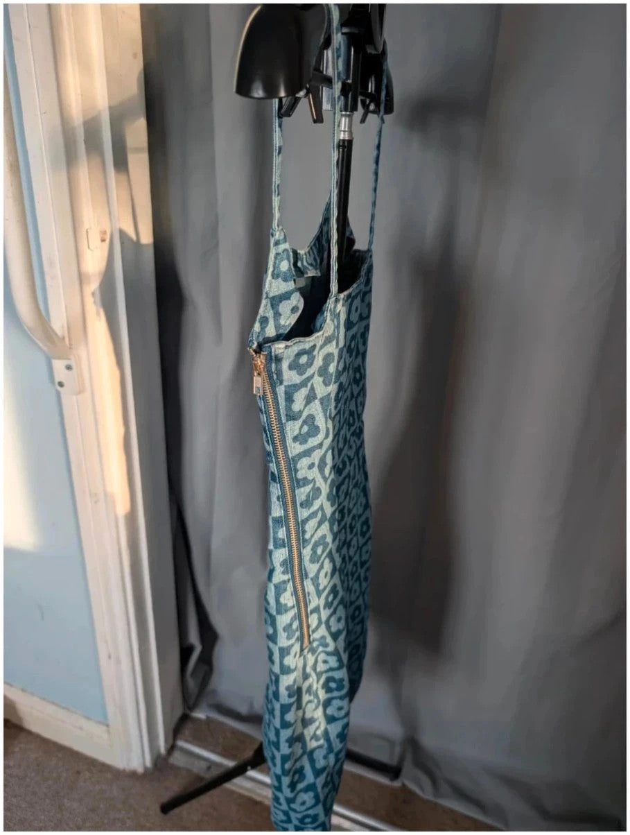 H&M blue floral checkered denim cami mini dress with fitted silhouette and thin straps.